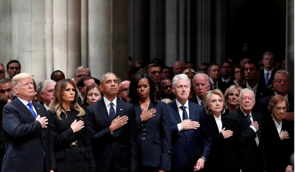 (From left) Donald Trump, first lady Melania Trump, Barack Obama, Michelle Obama, Bill Clinton, Jimmy Carter and Rosalynn Carter at George H.W. Bush’s funeral. Photo: Reuters