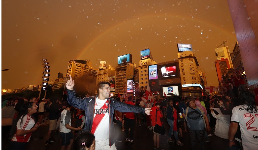 River Plate fans celebrate their team’s victory in the final of the Copa Libertadores, in Buenos Aires, Argentina. Photo: EPA