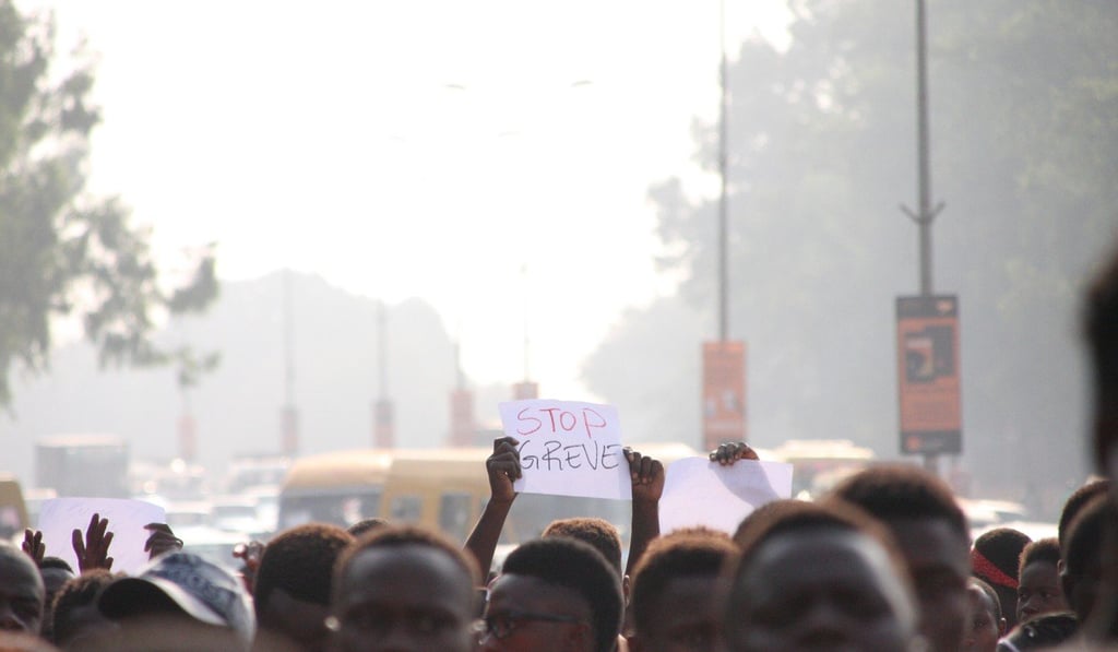 A student holds a placard reading ‘Stop strike’ during a demonstration in Bissau on December 7, 2018 to call for the reopening of the schools. A political deadlock has gripped the small African country. Photo: AFP A student holds a placard reading ‘Stop strike’ during a demonstration in Bissau on December 7, 2018 to call for the reopening of the schools. A political deadlock has gripped the small African country. Photo: AFP