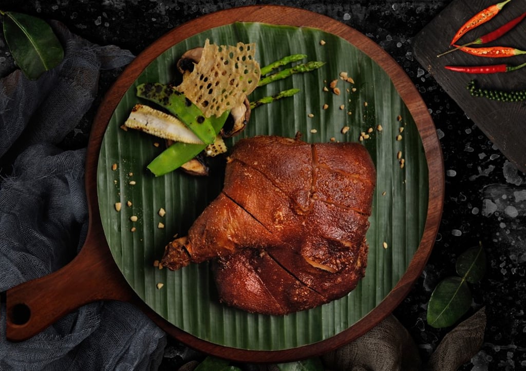 The Vietnamese suckling pig is marinated for three days before cooking.