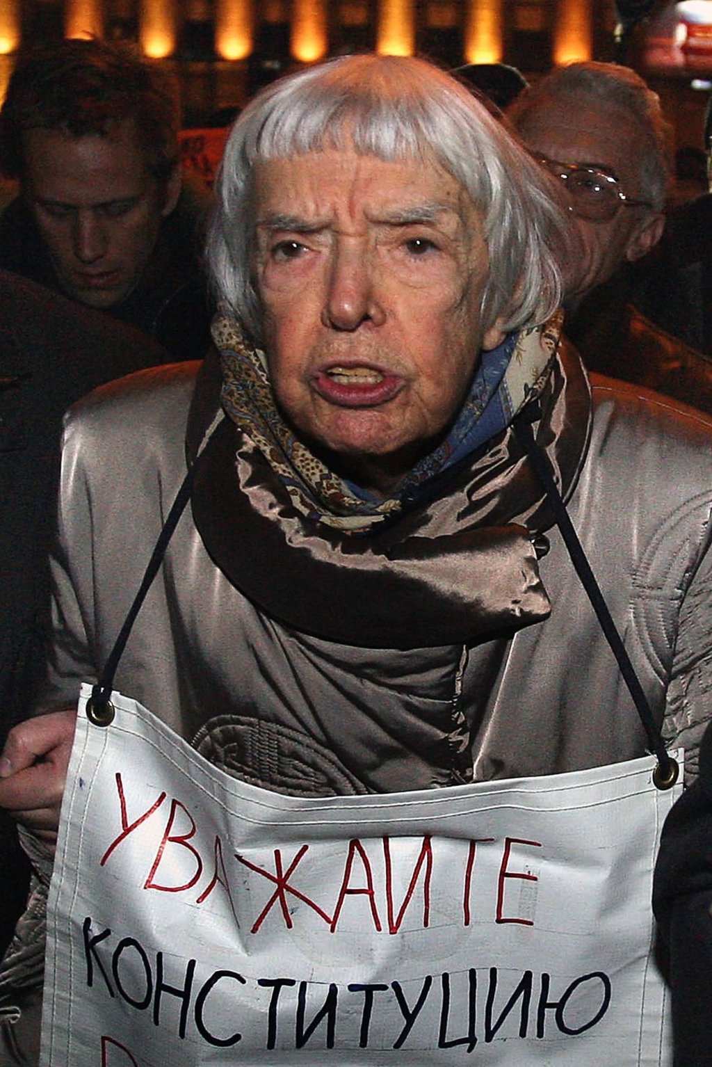 On October 31, 2009 Russian human rights activist Lyudmila Alexeyeva holds a poster reading ‘Respect the Constitution!’ in central Moscow. Photo: AFP