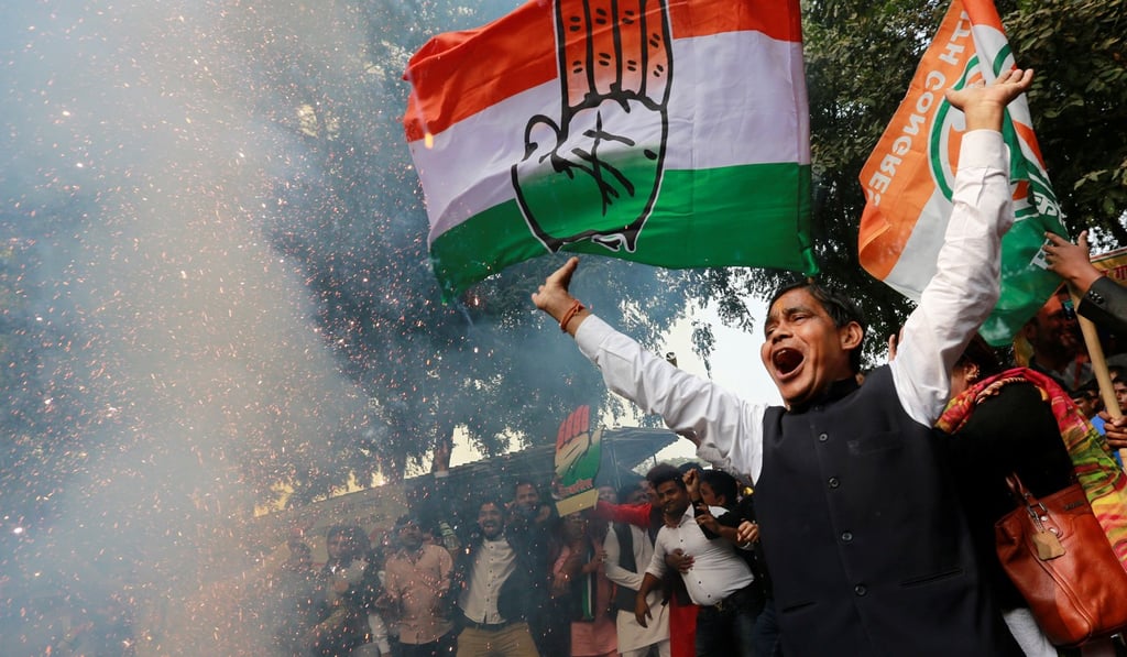 Congress supporters celebrate the election results. Photo: Reuters