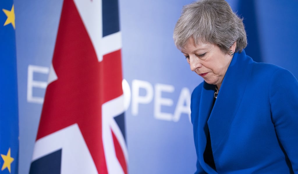 Theresa May, UK prime minister, departing from her news conference following a special meeting of the European Council on the Brexit withdrawal agreement in Brussels. Photo: Bloomberg