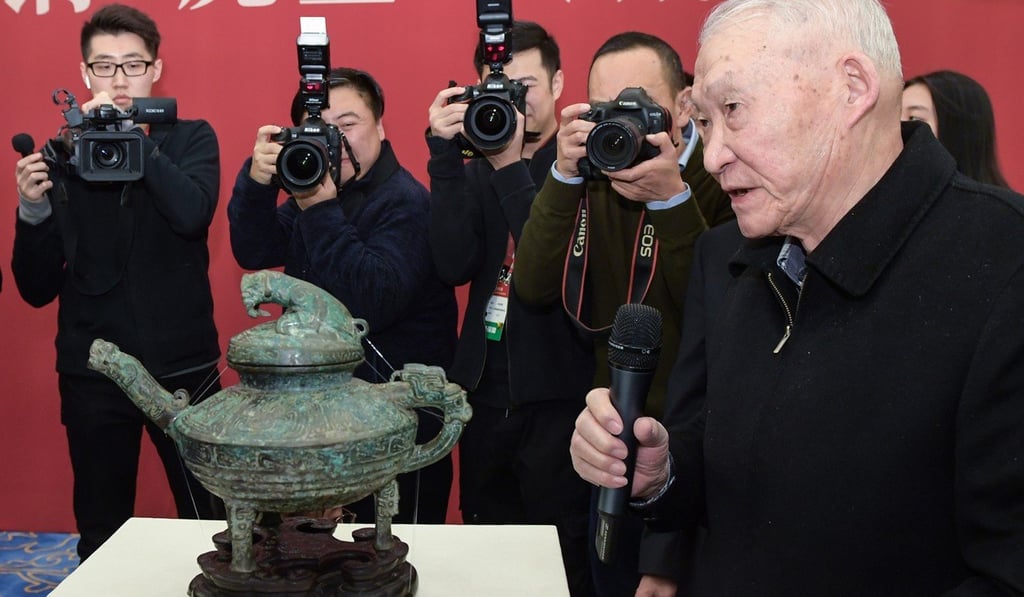 Sun Ji, honorary chairman of the National Museum of China’s research institute, tells the story of the returned bronze vessel on Tuesday. Photo: Xinhua Sun Ji, honorary chairman of the National Museum of China’s research institute, tells the story of the returned bronze vessel on Tuesday. Photo: Xinhua