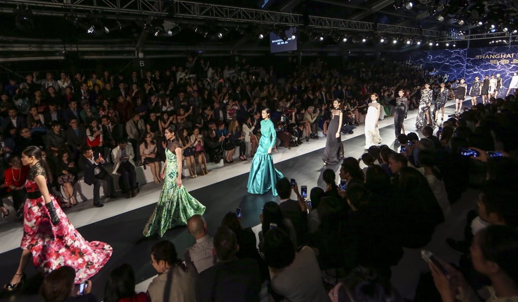 Models on the catwalk during Shanghai Tang's 20th anniversary celebration in Shanghai in 2014.