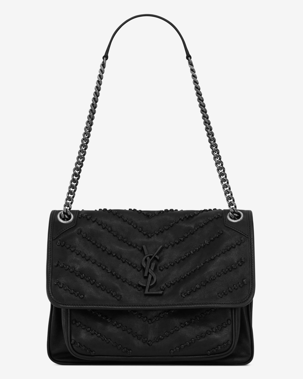 Medium Niki with studs in black leather.
