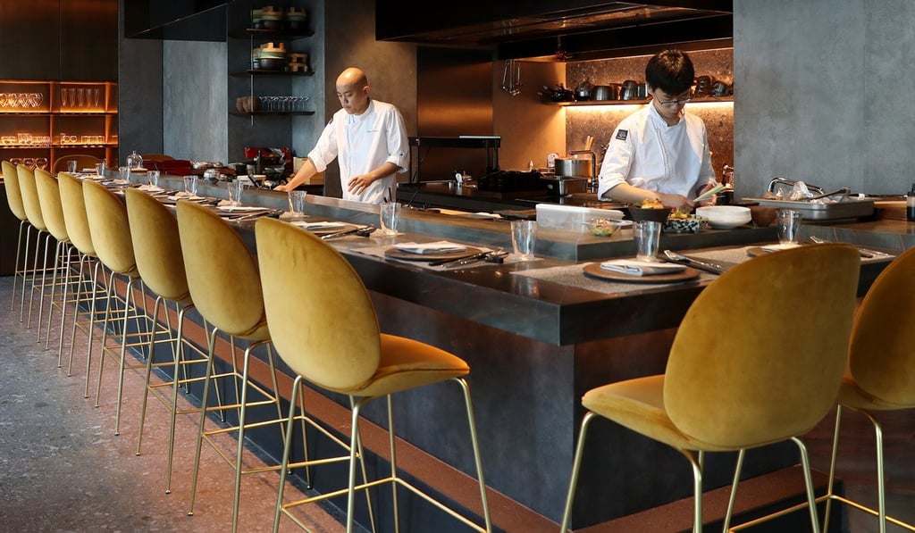 Ryota Kanesawa (left), head chef, at work in Ryota Kappou Modern. Photo: Winson Wong in Central.
