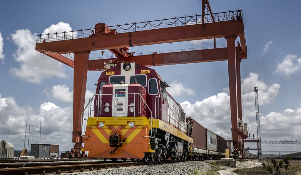 A Kenya Railways goods train carrying shipping containers departs from the port station on the Mombasa-Nairobi railway in Mombasa, Kenya. Photo: Bloomberg