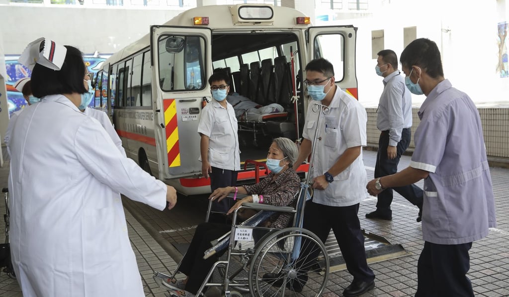 A patient from Queen Elizabeth Hospital is transferred to privately run St Teresa’s Hospital in Kowloon City as part of a plan to ease overcrowding in public hospitals, in July 2017. Photo: Edward Wong