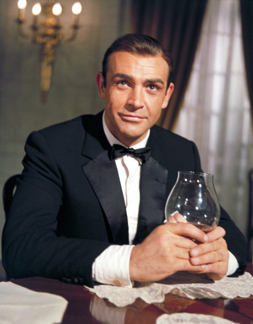 James Bond drinking again in a scene from Goldfinger in 1964. Photo: Alamy