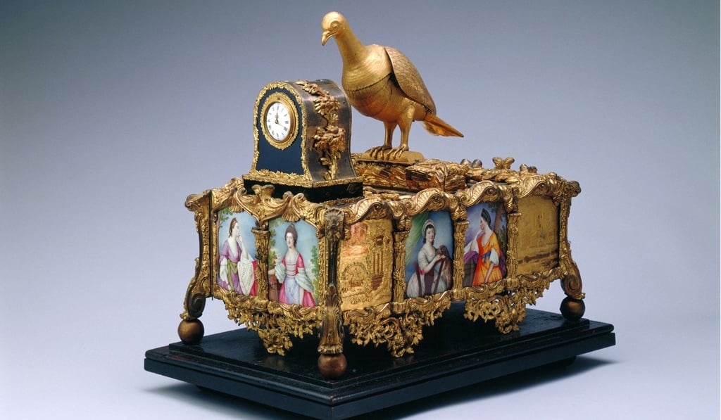 Gilt bronze clock with a music box and bird automaton, on show at ‘Treasures of Time’ exhibition at the Hong Kong Science Museum. This clock has two tiers. Its bottom tier is a music box. Photo: The Palace Museum