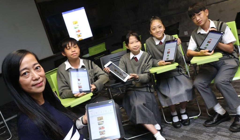 English teacher Edith Wong with students (from left to right), Hugo Wong, Alice Chang Ka-yi, Agenda Wong Yee-ching and Peter Xiao Ming-da. Photo: K.Y. Cheng