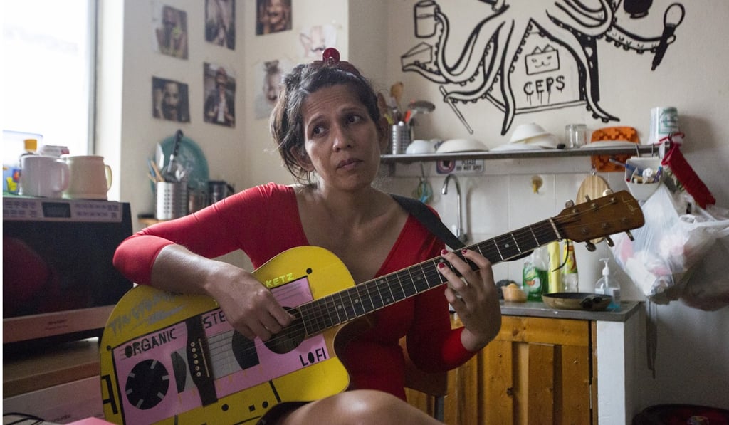 Shika jams in her living room in Kuala Lumpur. Photo: Alexandra Radu Shika jams in her living room in Kuala Lumpur. Photo: Alexandra Radu