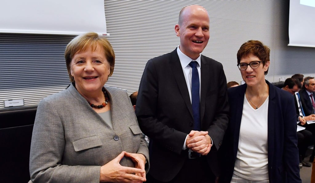 From left: Merkel, Brinkhaus and new Christian Democratic Union leader Annegret Kramp-Karrenbauer. Photo: AFP