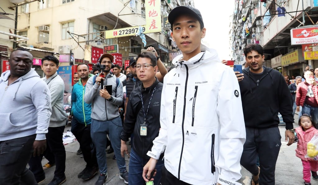 Wong Ching-kit arrives in Sham Shui Po with his donation of HK$92,000. Photo: Dickson Lee