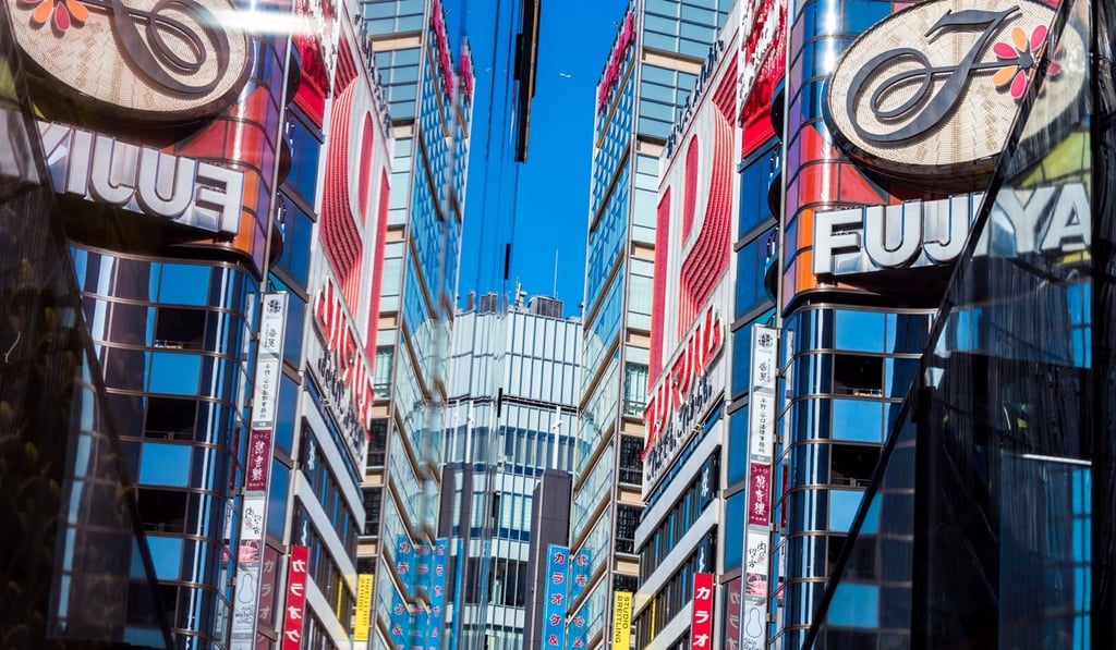 Reflections off the glass from the buildings in Ginza, Tokyo. Photo: Lukasz Palka