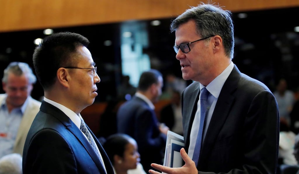 China’s ambassador to the World Trade Organisation Zhang Xiangchen and American counterpart Dennis Shea. Photo: Reuters