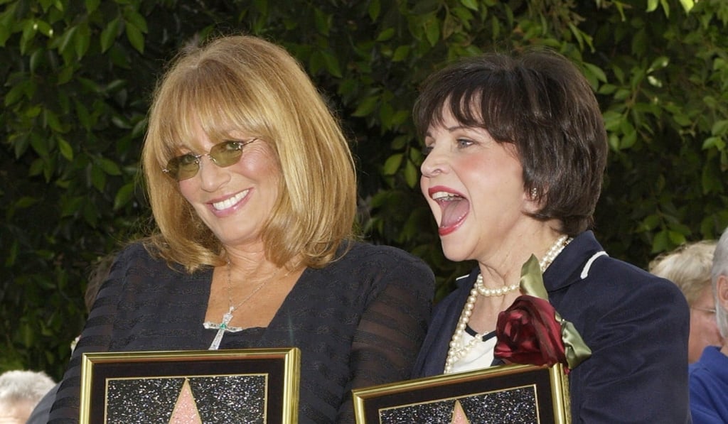 Penny Marshall, left, and Cindy Williams, who co-starred in the 1970s hit TV series Laverne & Shirley, pose following an unveiling ceremony honouring them with stars on the Hollywood Walk of Fame in 2004. Photo: Reuters