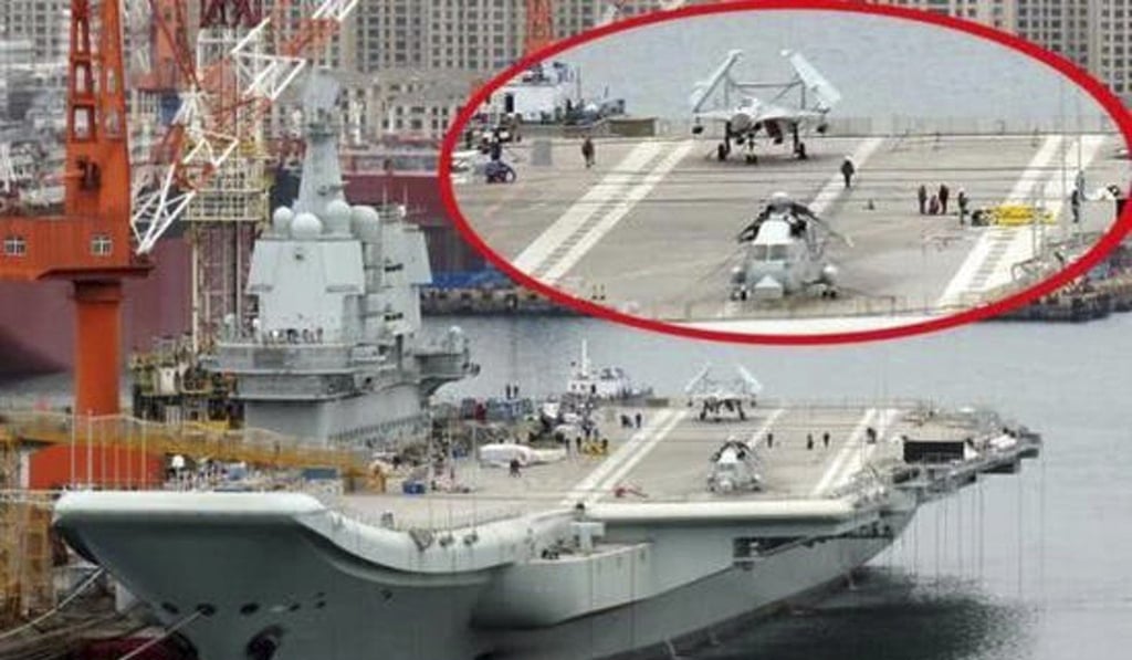 One of the photos circulating online shows the Type 001A with two aircraft on its deck. Source: Sina