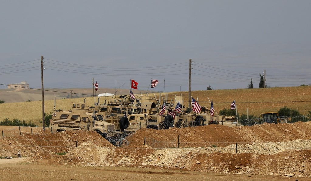 US administration officials recently disputed the idea that Islamic State is defeated and suggested US involvement would continue. Pictured are vehicles of the US-backed coalition in the northern Syrian town of Manbij. Photo: AFP US administration officials recently disputed the idea that Islamic State is defeated and suggested US involvement would continue. Pictured are vehicles of the US-backed coalition in the northern Syrian town of Manbij. Photo: AFP