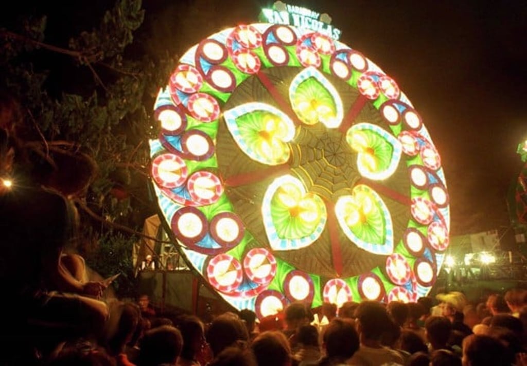 A giant Christmas lantern resting on a truck glitters with coloured lights during a lantern competition in San Fernando, a town in the northern Philippines. Photo: Reuters
