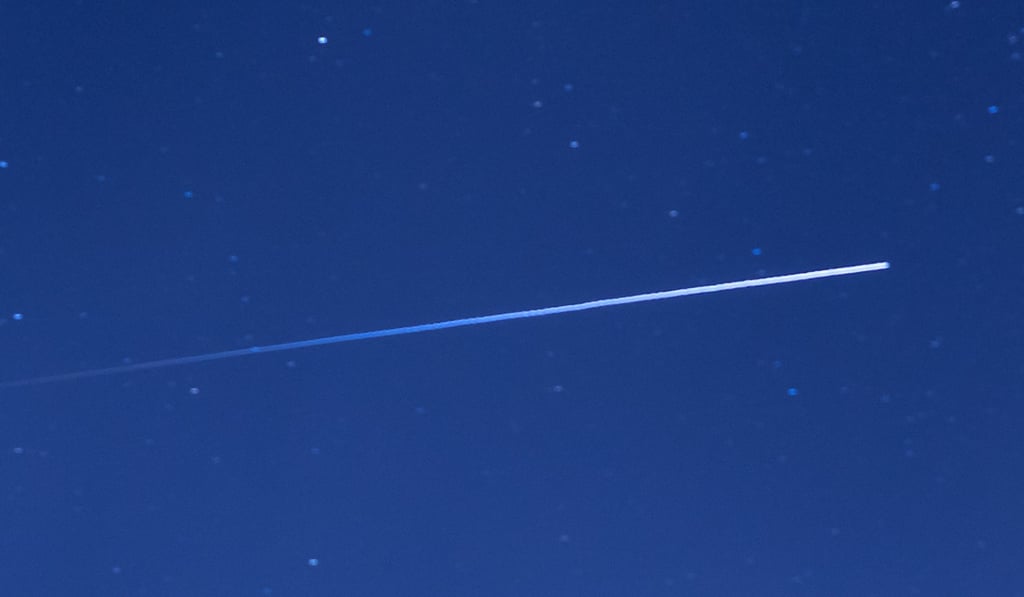 The ISS leaves a trail of light in its wake as it speeds across the sky. Photo: Shutterstock