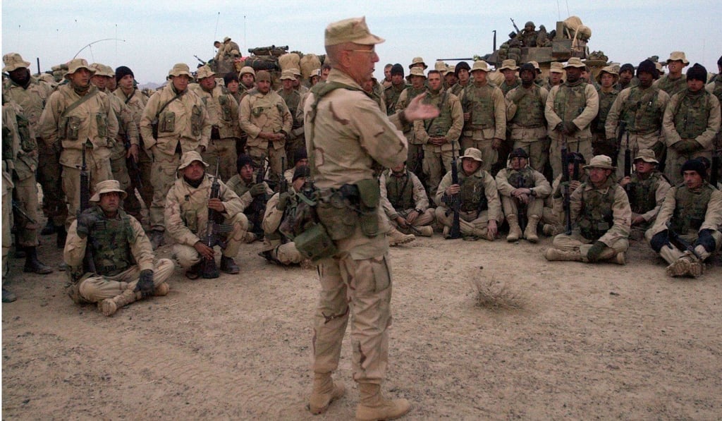 Former brigadier general James Mattis talking with US marines in Kandahar, Afghanistan, in December 2001. Photo: Reuters