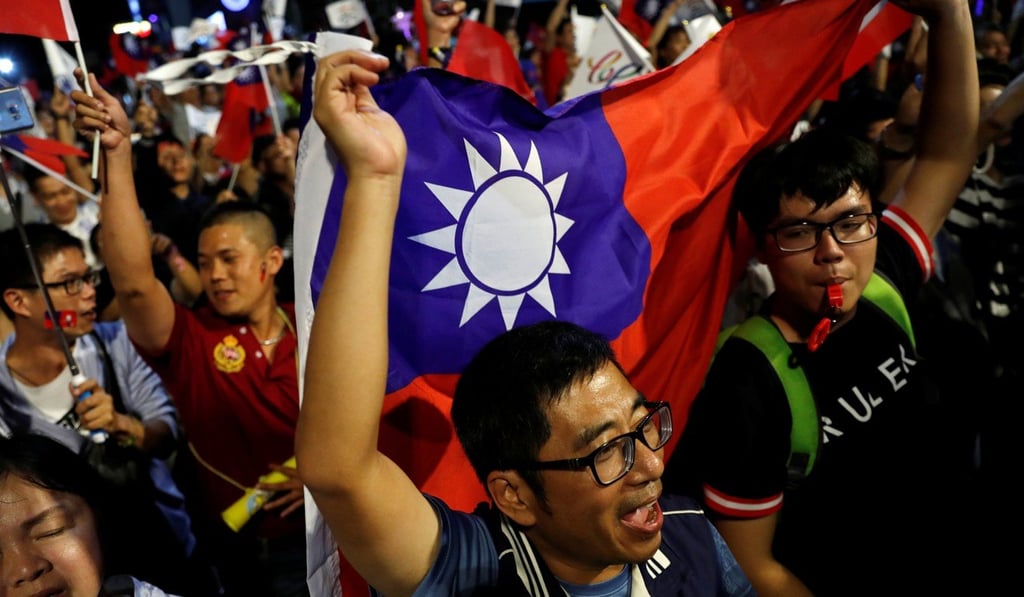 Supporters of Kuomintang mayoral candidate Han Kuo-yu celebrate after he won the local elections in Kaohsiung, Taiwan, on November 24. Photo: Reuters