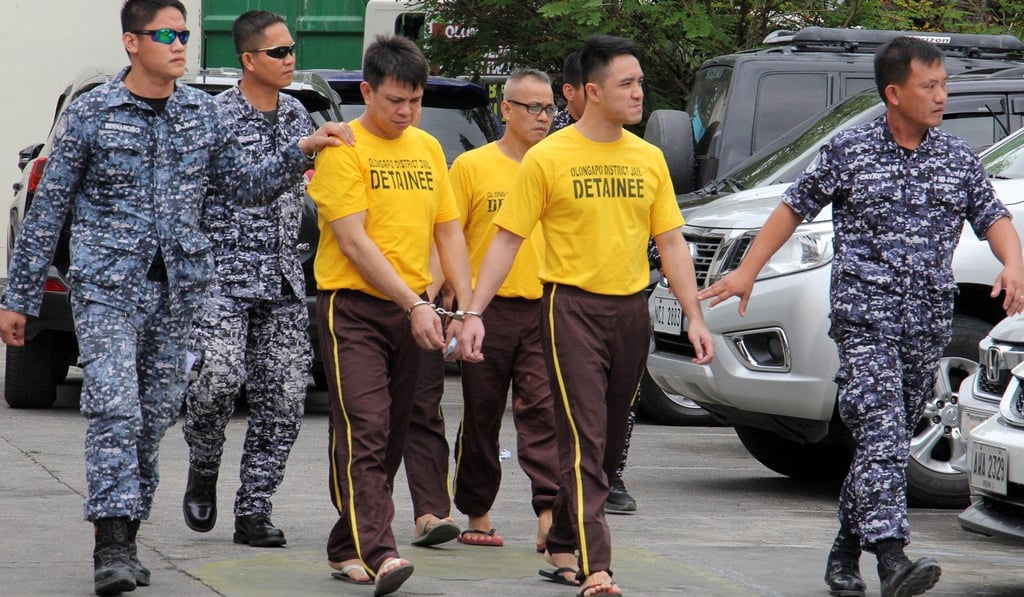 Hongkongers are escorted by jail personnel after being sentenced to life imprisonment for drug possession in Olongapo, in the Philippines, on December 14. Leung Shu-fook, Lo Wing-fai, Kwok Kam-wah and Chan Kwok-tung claim they have been framed. Photo: EPA Hongkongers are escorted by jail personnel after being sentenced to life imprisonment for drug possession in Olongapo, in the Philippines, on December 14. Leung Shu-fook, Lo Wing-fai, Kwok Kam-wah and Chan Kwok-tung claim they have been framed. Photo: EPA