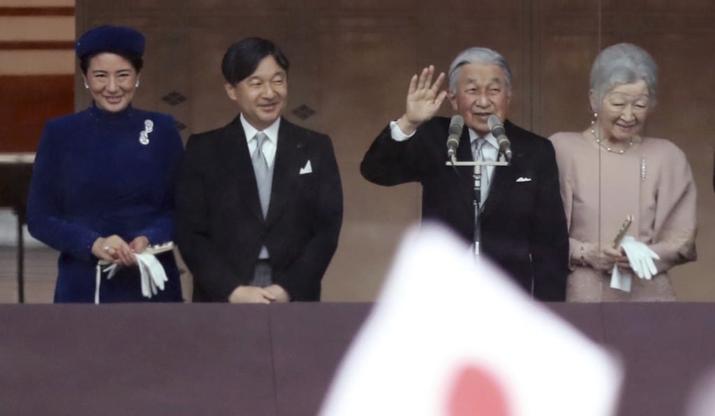 From left to right, Japan's Crown Princess Masako, Crown Prince Naruhito, Emperor Akihito, Empress Michiko, greet to well-wishers as they appear on the balcony of the Imperial Palace to mark the emperor's 85th birthday in Tokyo. Photo: AP