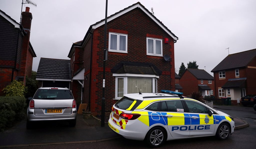 A police car parked outside a house in Crawley on December 23, 2018 after a drone was flown near Gatwick airport. Photo: Reuters