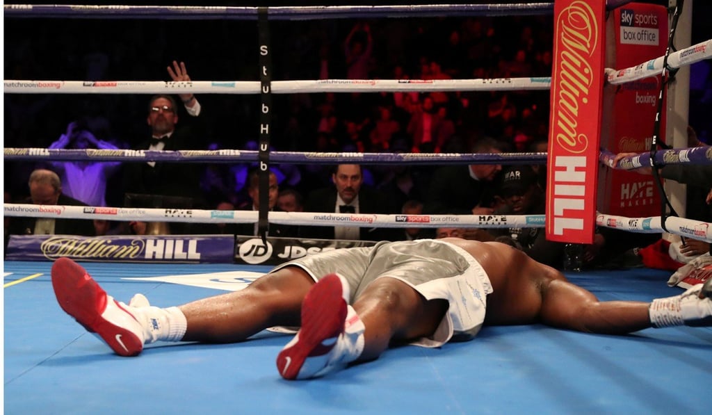 Dereck Chisora lays supine after being knocked out by fellow Briton Dillian Whyte in London. Photo: Reuters