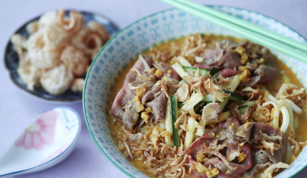 Satay soup with poached beef and udon. Photo: Jonathan Wong