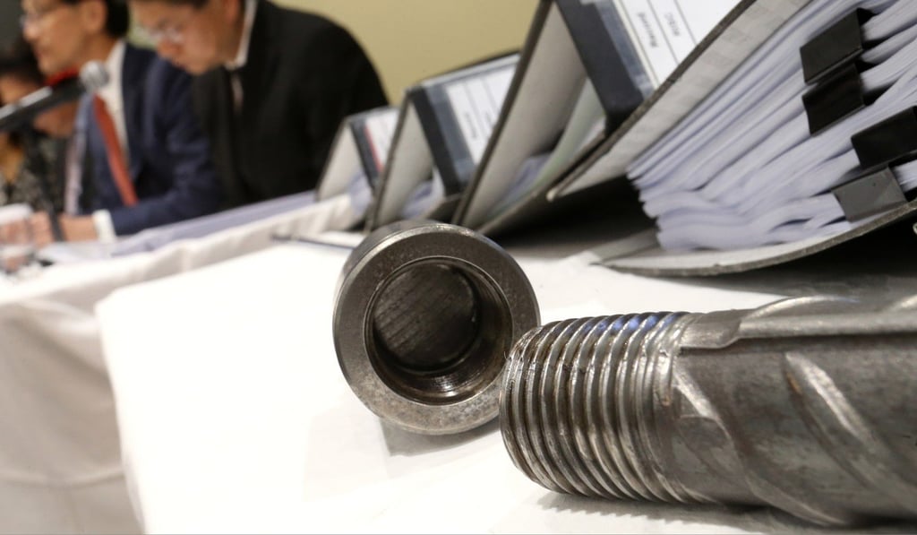 The threads cited by Yim are the slanted grooves which guide the screw end into the coupler. Photo: Dickson Lee