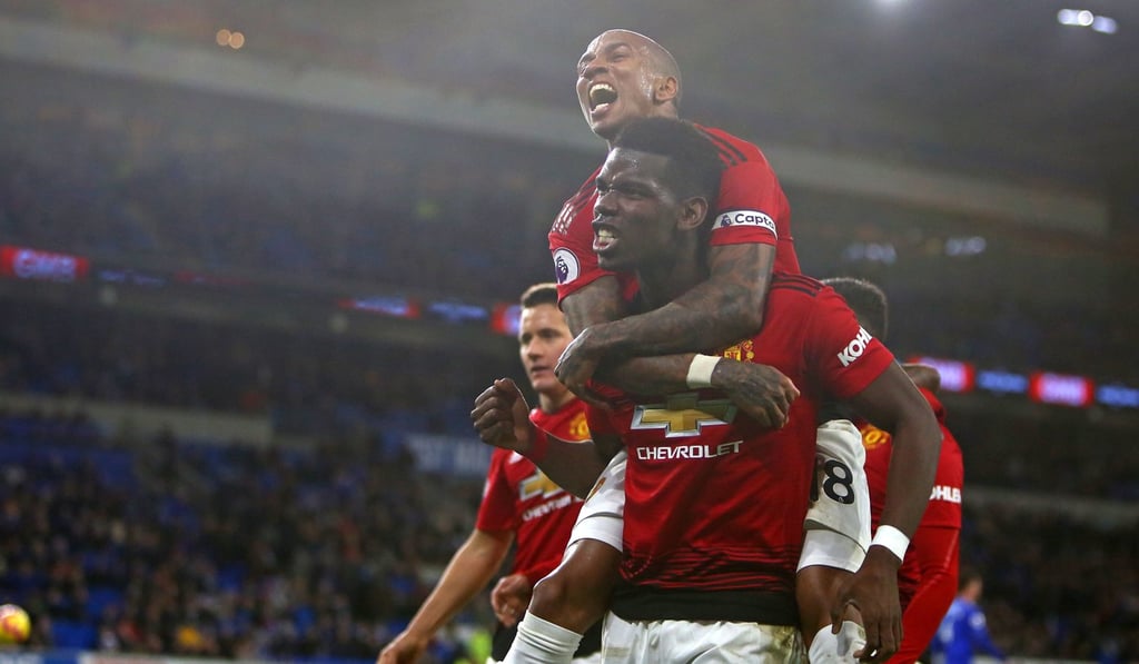 Paul Pogba and Ashley Young celebrate after Jesse Lingard scores Manchester United’s fifth goal at Cardiff. Photo: AFP Paul Pogba and Ashley Young celebrate after Jesse Lingard scores Manchester United’s fifth goal at Cardiff. Photo: AFP