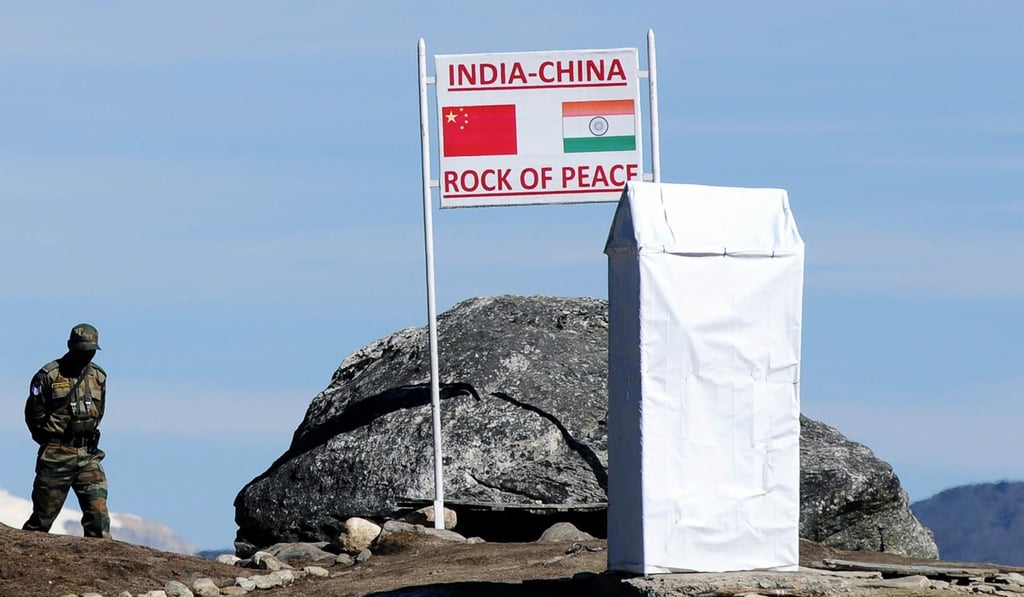 An October, 2012 photo of an Indian soldier keeping watch at Bumla Pass on the India-China border in Arunachal Pradesh. Photo: AFP