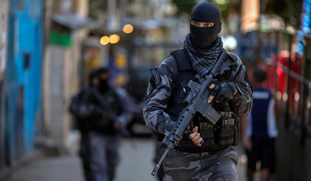File photo of a Brazilian Military Police member on patrol in the Rocinha favela in Rio de Janeiro. Photo: AFP