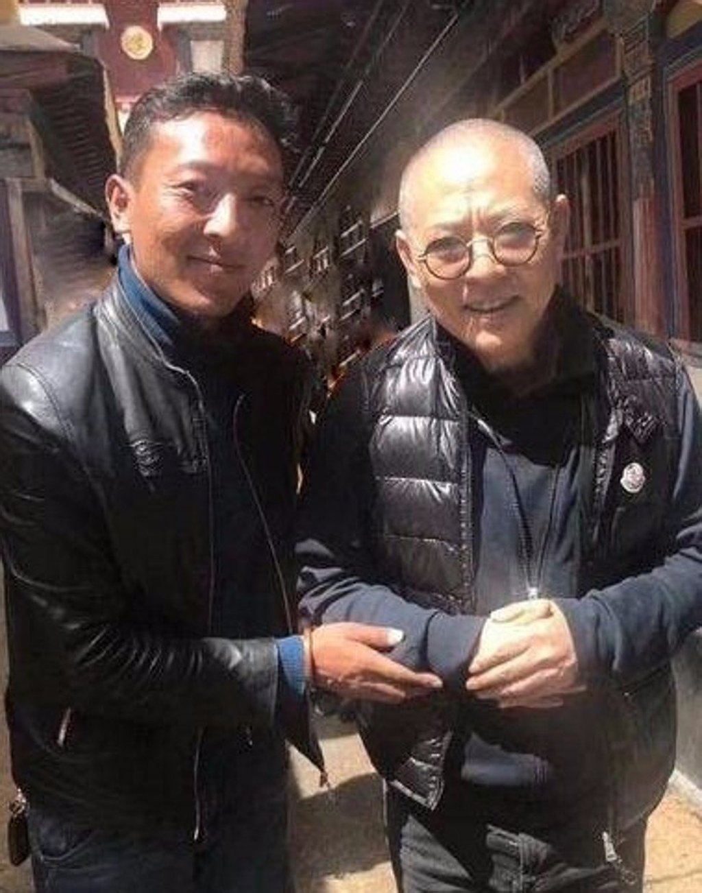 Jet Li and friend visit a temple in Tibet. Photo: Twitter