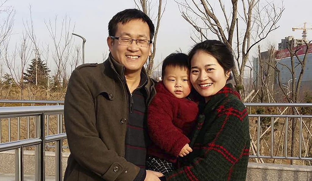 Wang Quanzhang and his wife Li Wenzu with their son in 2015. Photo: AP