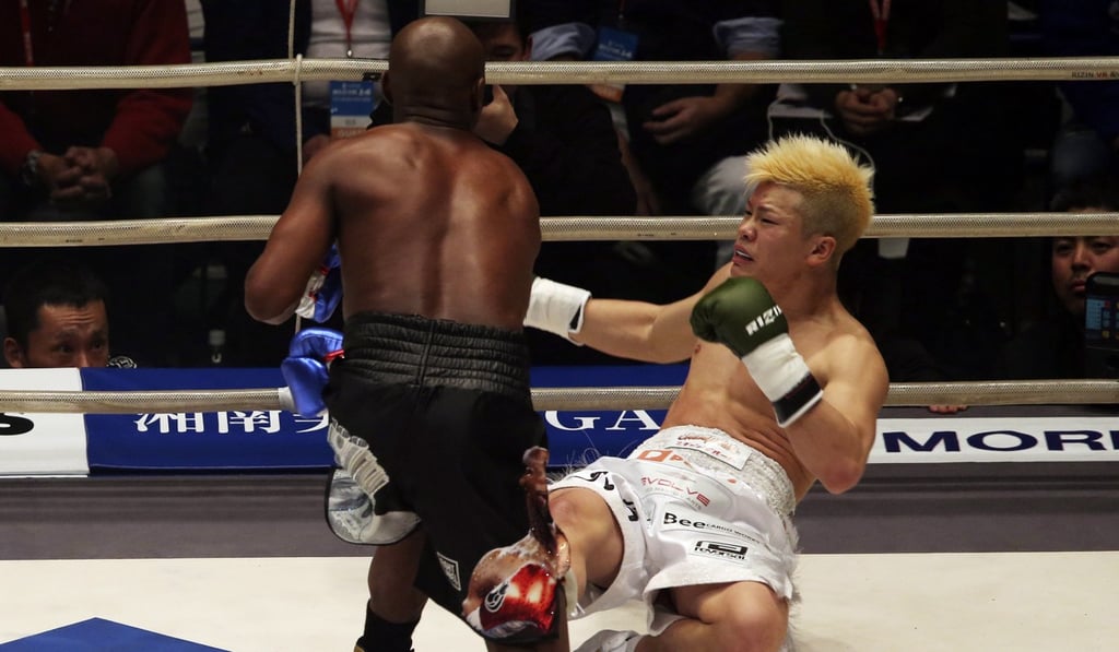 Japanese kick-boxer Tenshin Nasukawa on his way to the canvas. Photo: AP Japanese kick-boxer Tenshin Nasukawa on his way to the canvas. Photo: AP