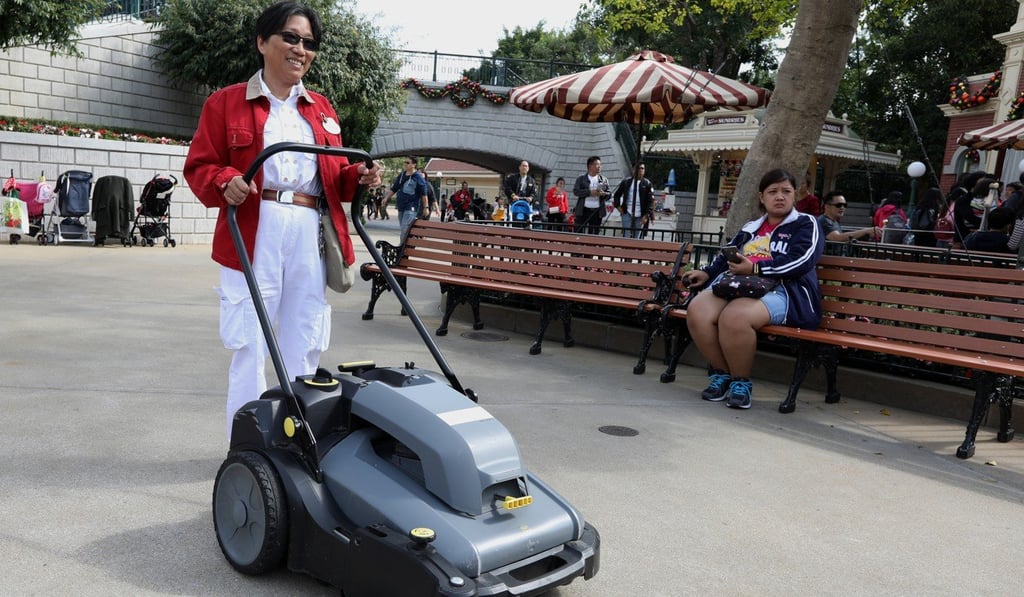Eleanor Fung Siu-lin, Disneyland’s 59-year-old leader of cleaning operations, will benefit. Photo: Roy Issa