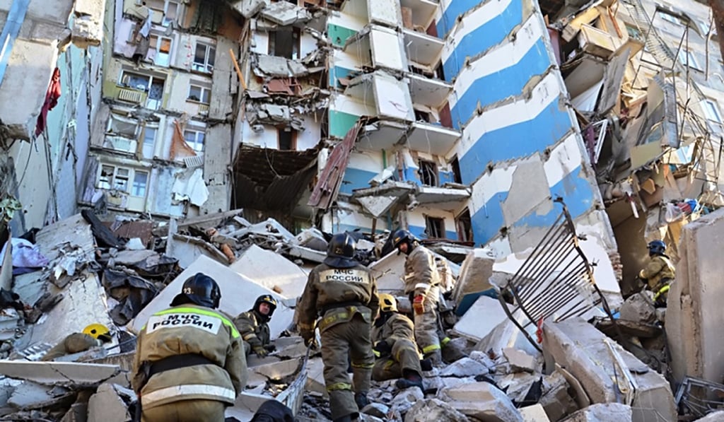 Rescuers moving debris after a gas explosion in Magnitogorsk, Russia, on Monday. Photo: EPA/Russian Emergency Situations Ministry Rescuers moving debris after a gas explosion in Magnitogorsk, Russia, on Monday. Photo: EPA/Russian Emergency Situations Ministry
