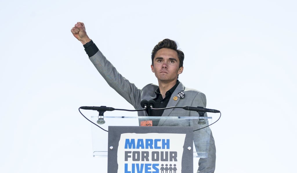 David Hogg, a survivor of the school shooting at Marjory Stoneman Douglas High School in February, speaks at the March for Our Lives in Washington on March 24. Photo: EPA