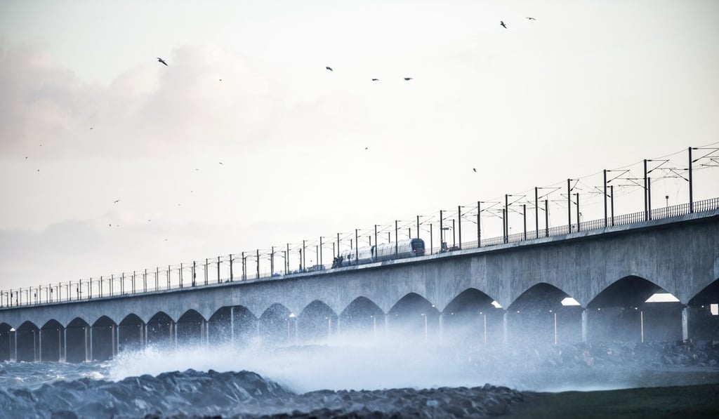 A passenger train is seen on the Great Belt Bridge after a railway accident on January 2, 2019 in Nyborg, Denmark. Photo: AFP