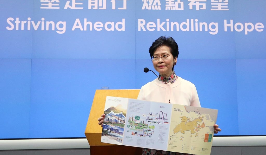 Hong Kong Chief Executive Carrie Lam Cheng Yuet-ngor with a pamphlet regarding the Lantau Tomorrow Vision project. Photo: Dickson Lee