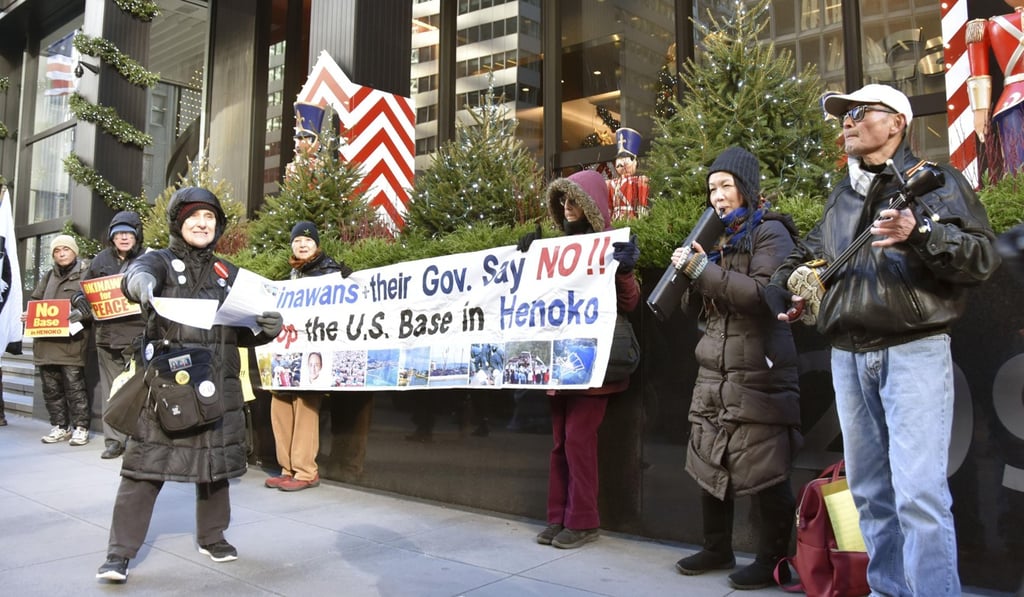 Protesters in front of the Japanese Consulate General in New York. Photo: Kyodo