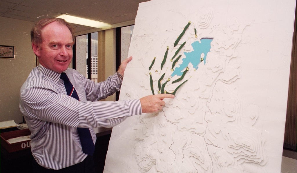 John Halliday, chairman of the Golf Association of Hongkong's Public Golf Sub-Committee, with a map of the proposed golf course at Kau Sai Chau.