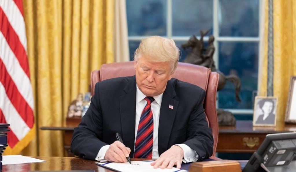 US President Donald Trump signs the Asia Reassurance Initiative Act into law on Monday. Photo: Handout.