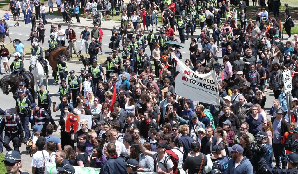 Far-left and far-right protesters spill onto St Kilda Esplanade in Melbourne on January 5, 2019. Photo: EPA
