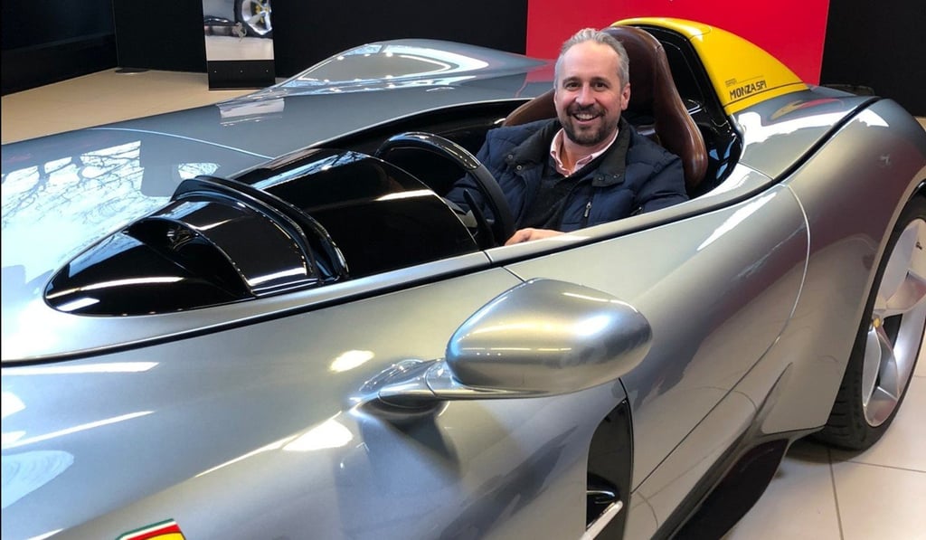 Matthew DeBord sits inside Ferrari’s open-topped single-seat Monza SP1.